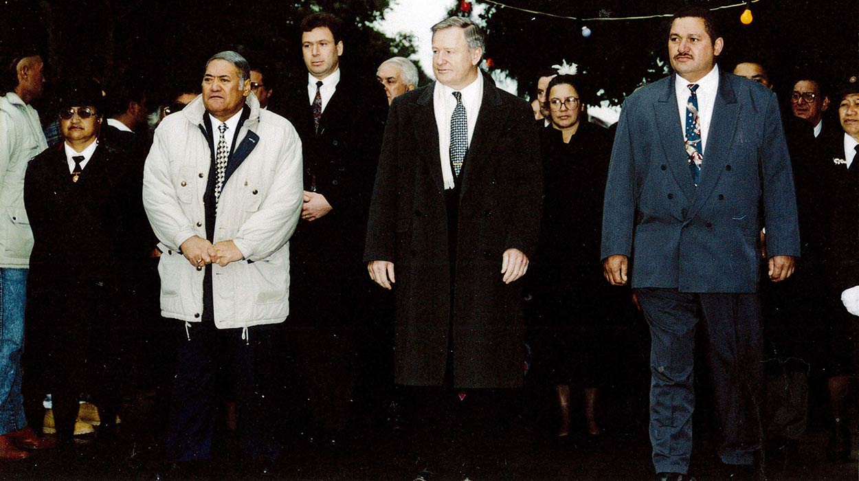 Sir Robert Mahuta, Jim Bolger and others standing at the front of a crowd.